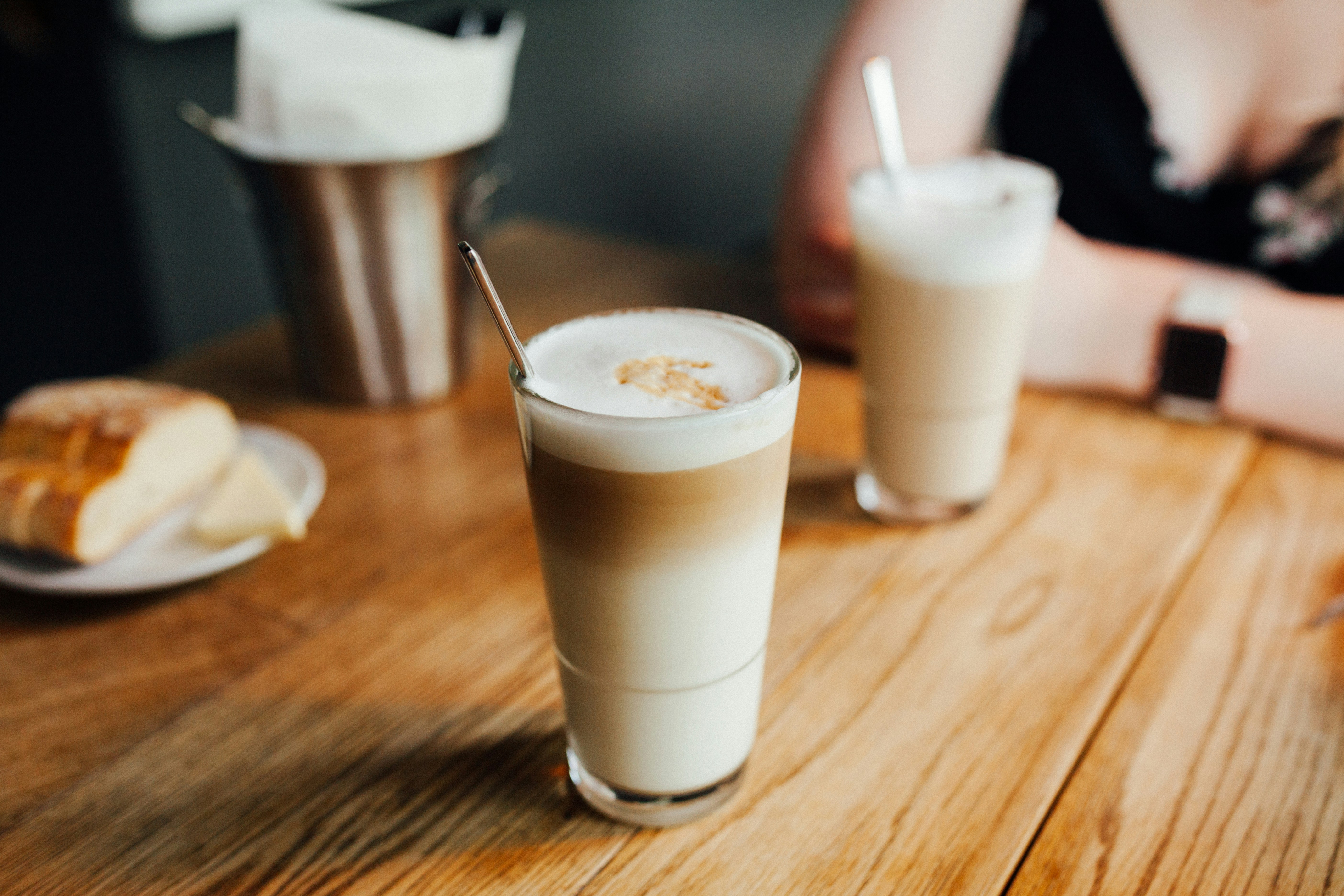 a latte and milkshakes on a cafe table