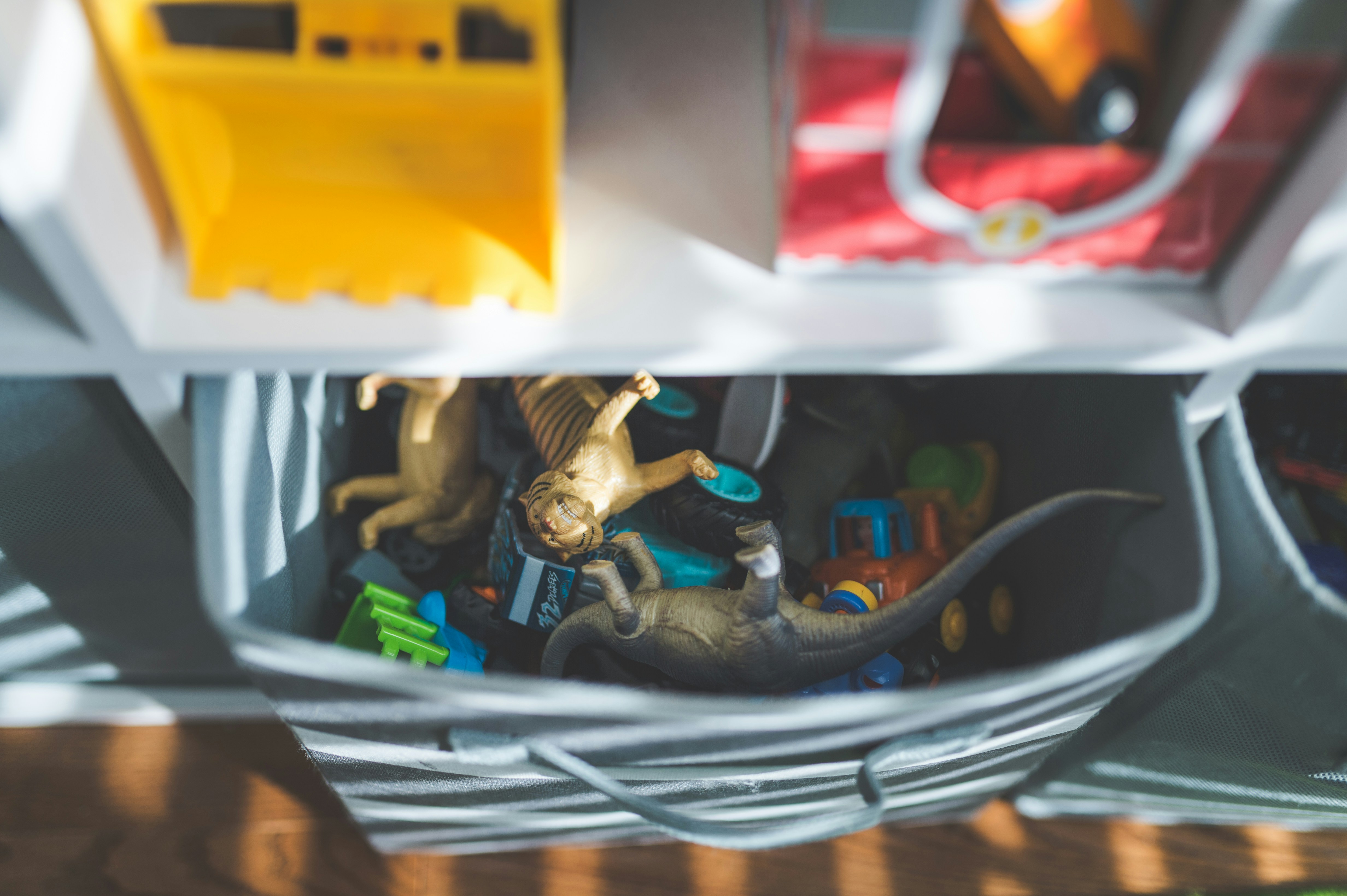 a basket of children's toys tipped open