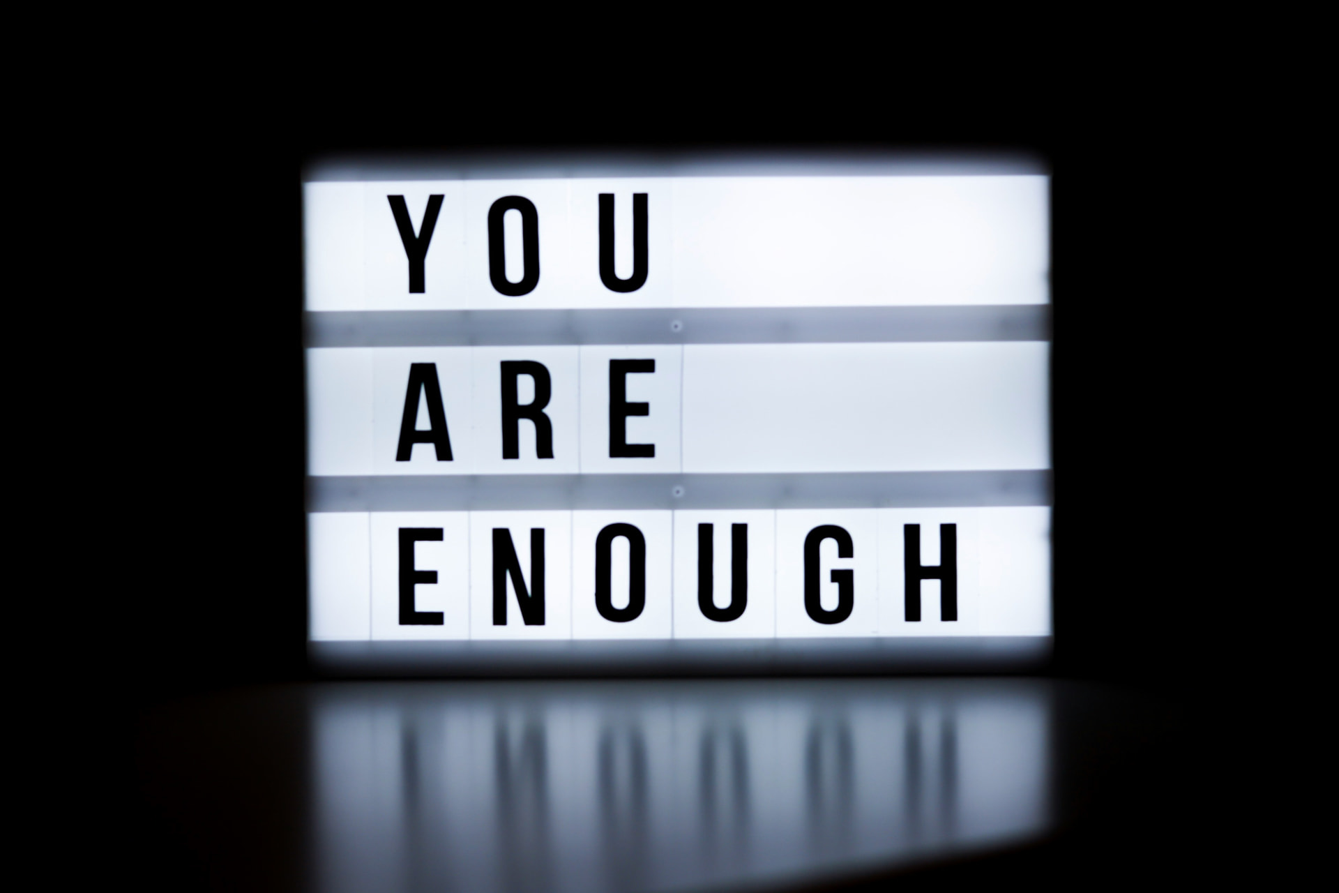 a lightbox reading you are enough